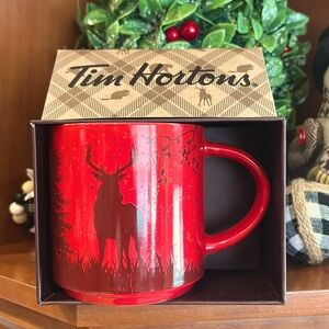 Beautiful collector mug deer on both sides and Tim Horton logo inside of mug